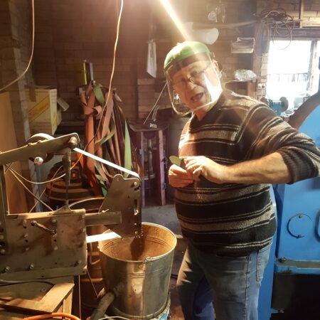 old man making his first knife with the beginner knife making kit from gameco artisan supplies