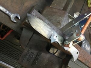 Sand off all the scale and oxides from heat treating