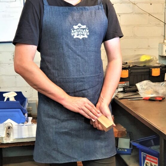 Artisan Supplies Denim Apron model wearing an Artisan Supplies Denim Apron