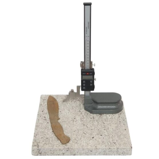 Granite surface plate 300 x 300 mm with a knife blank and digital height gauge sitting on it.
