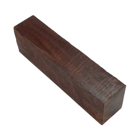 Side view of a reddish brown ringed gidgee handle block with tight figured grain