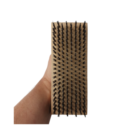 Wood Handle Butcher Block with Carbon Steel Bristles In hand front on